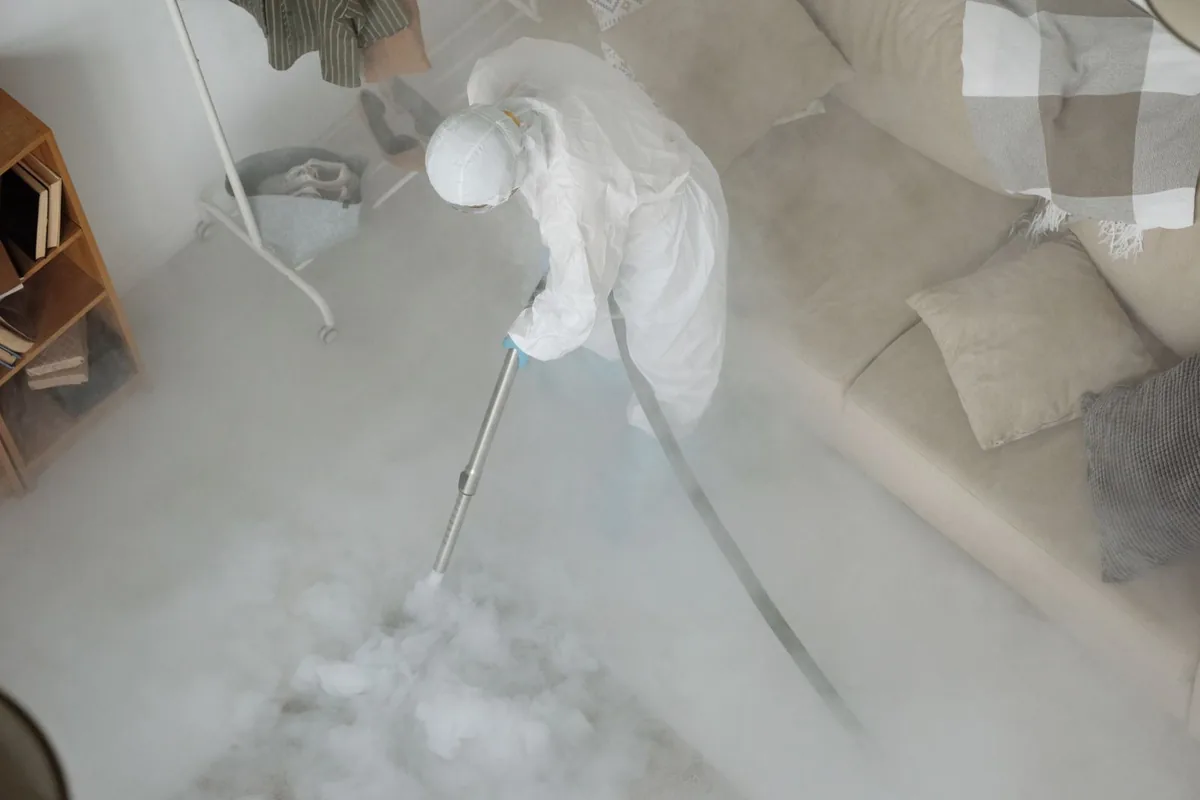 Biohazard cleanup technician in protective equipment, Dayton, NV